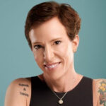 Headshot of Kerry Hecht, founder and CEO, 10k Humans, in a black tanktop.